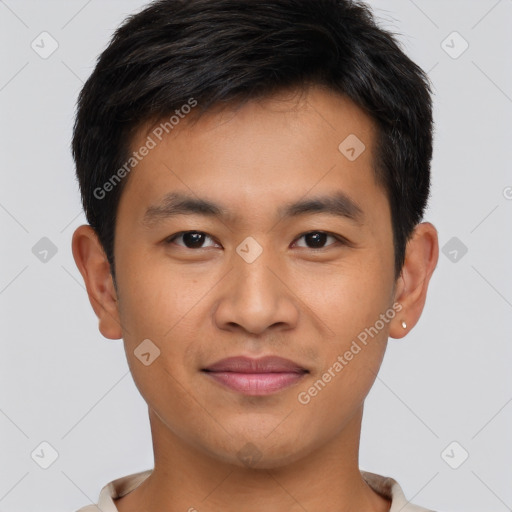 Joyful asian young-adult male with short  brown hair and brown eyes