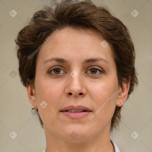 Joyful white adult female with short  brown hair and brown eyes