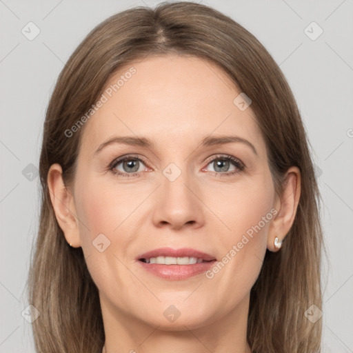 Joyful white adult female with long  brown hair and grey eyes