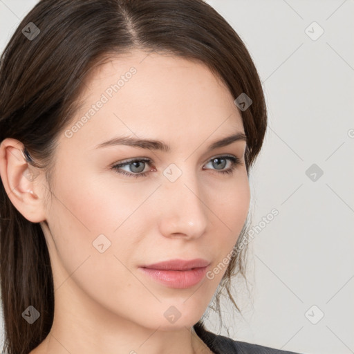 Neutral white young-adult female with medium  brown hair and brown eyes