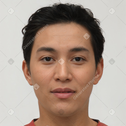 Joyful latino young-adult male with short  brown hair and brown eyes