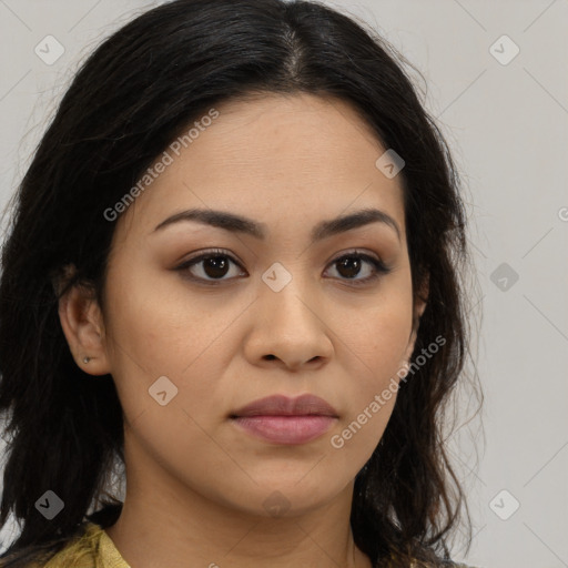 Joyful latino young-adult female with long  brown hair and brown eyes