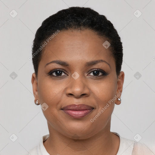 Joyful black young-adult female with short  brown hair and brown eyes