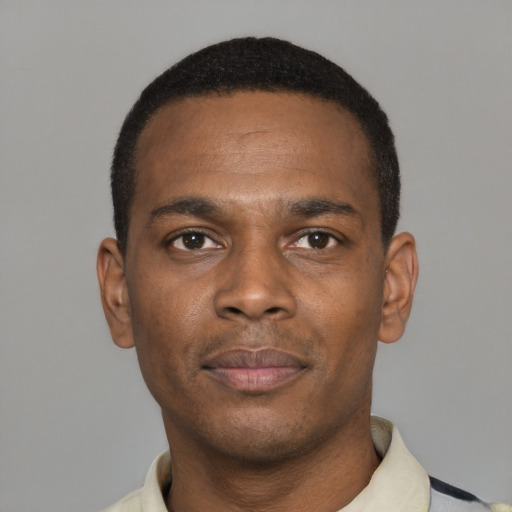 Neutral black young-adult male with short  black hair and brown eyes