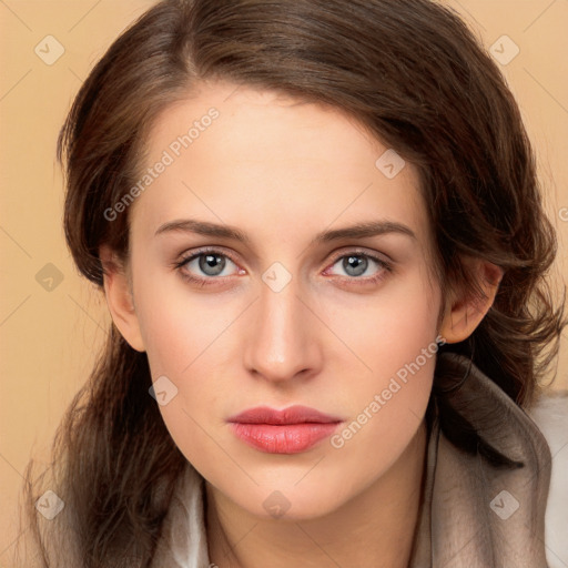 Neutral white young-adult female with long  brown hair and brown eyes