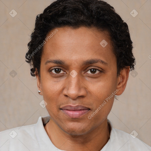 Joyful black young-adult male with short  brown hair and brown eyes