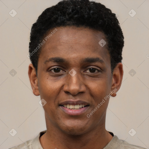 Joyful black young-adult male with short  black hair and brown eyes