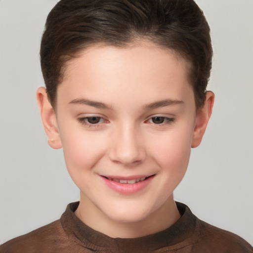 Joyful white child female with short  brown hair and brown eyes