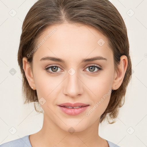 Joyful white young-adult female with medium  brown hair and green eyes