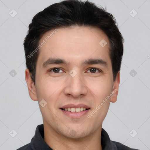 Joyful white young-adult male with short  black hair and brown eyes