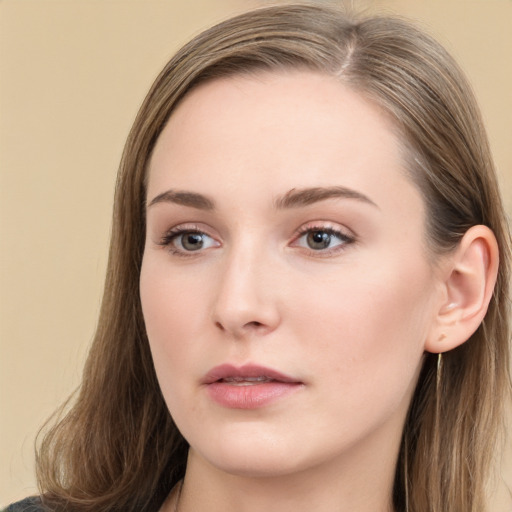 Neutral white young-adult female with long  brown hair and grey eyes