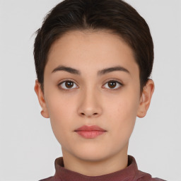 Neutral white young-adult female with short  brown hair and brown eyes