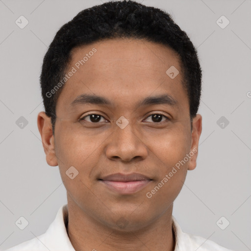 Joyful latino young-adult male with short  black hair and brown eyes