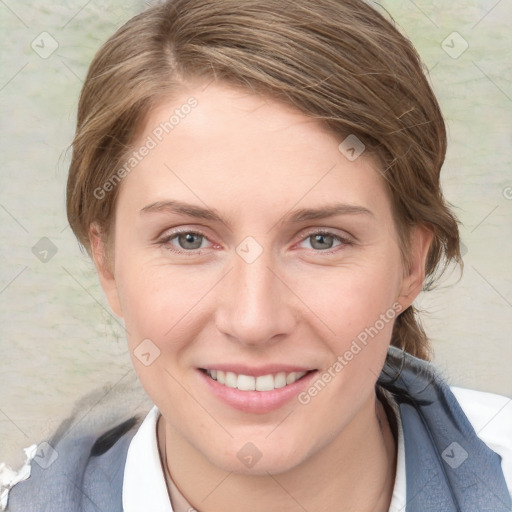 Joyful white young-adult female with medium  brown hair and blue eyes