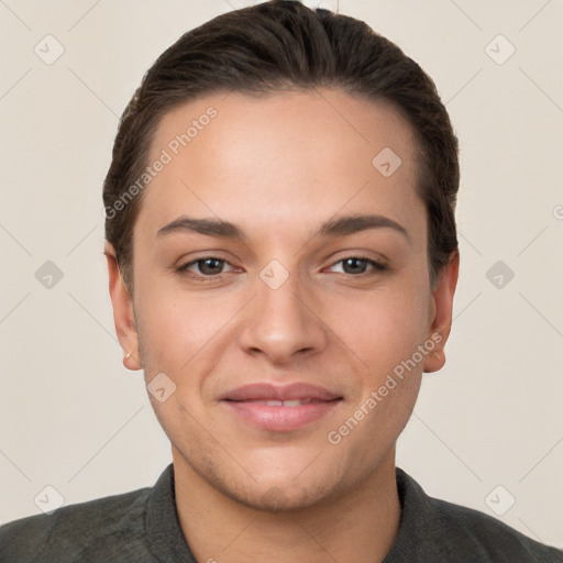 Joyful white young-adult female with short  brown hair and brown eyes