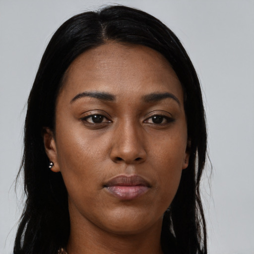 Neutral black young-adult female with long  black hair and brown eyes