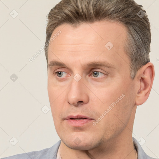 Neutral white adult male with short  brown hair and brown eyes