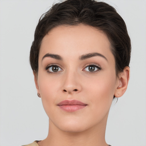 Neutral white young-adult female with short  brown hair and brown eyes