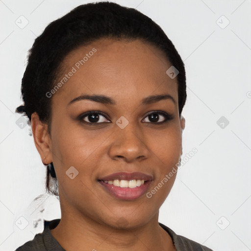 Joyful latino young-adult female with short  black hair and brown eyes