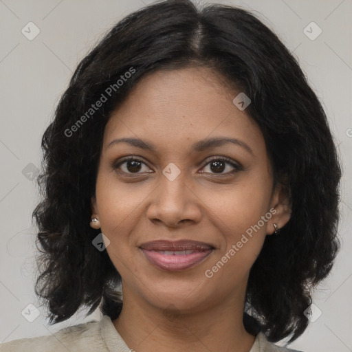 Joyful black young-adult female with medium  brown hair and brown eyes