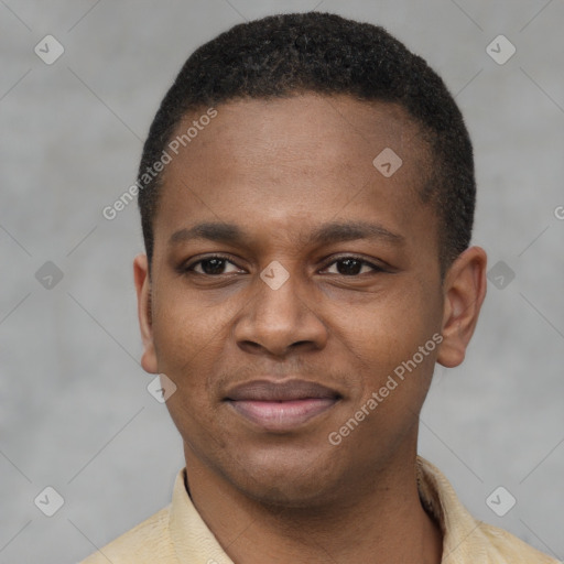 Joyful latino young-adult male with short  brown hair and brown eyes