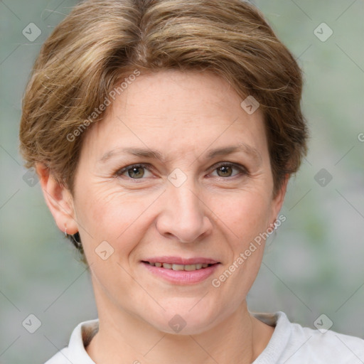 Joyful white adult female with short  brown hair and brown eyes