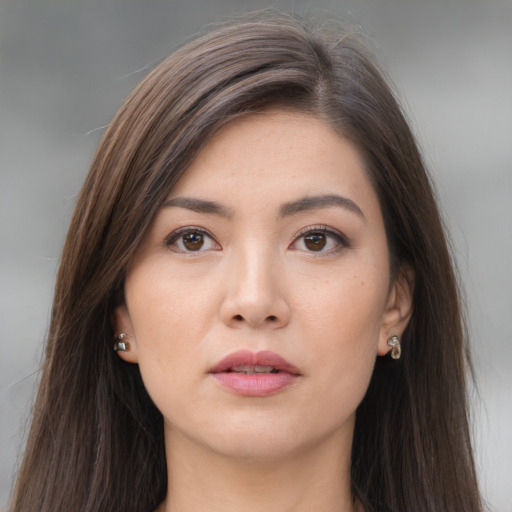 Neutral asian young-adult female with long  brown hair and brown eyes