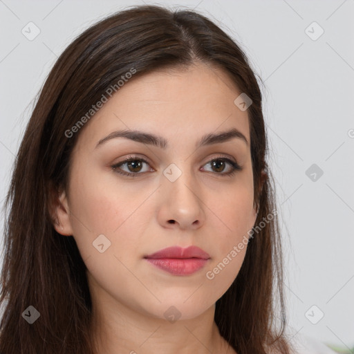 Neutral white young-adult female with long  brown hair and brown eyes