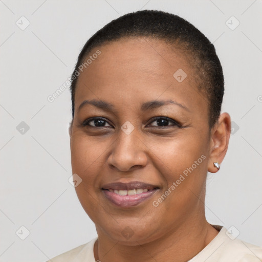 Joyful latino young-adult female with short  brown hair and brown eyes