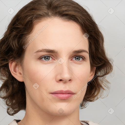 Neutral white young-adult female with medium  brown hair and green eyes