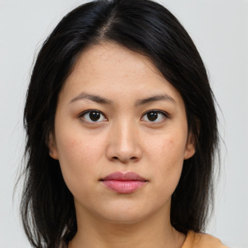 Neutral asian young-adult female with medium  brown hair and brown eyes