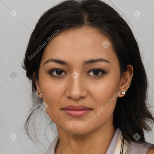 Joyful latino young-adult female with long  brown hair and brown eyes