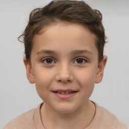 Joyful white child female with short  brown hair and brown eyes