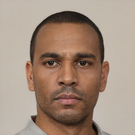 Neutral latino adult male with short  black hair and brown eyes