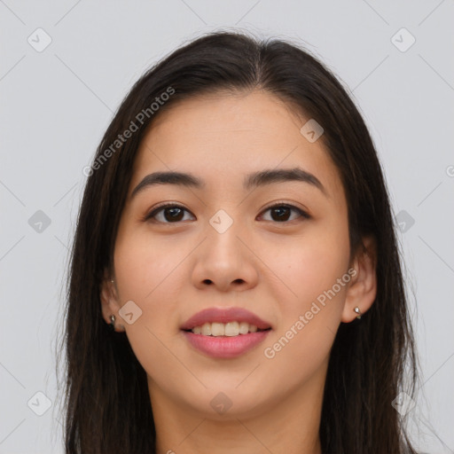 Joyful asian young-adult female with long  brown hair and brown eyes