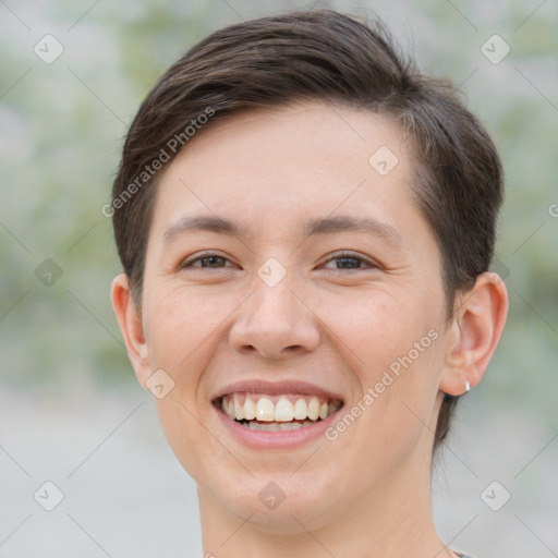 Joyful white young-adult female with short  brown hair and brown eyes