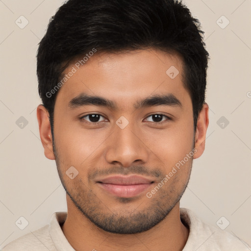 Joyful latino young-adult male with short  brown hair and brown eyes