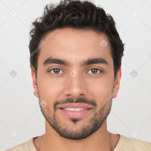 Joyful white young-adult male with short  black hair and brown eyes