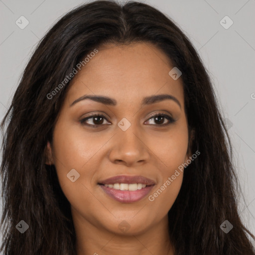 Joyful latino young-adult female with long  brown hair and brown eyes