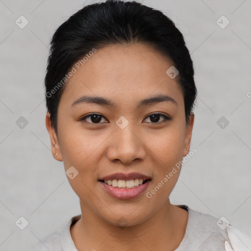 Joyful asian young-adult female with short  black hair and brown eyes