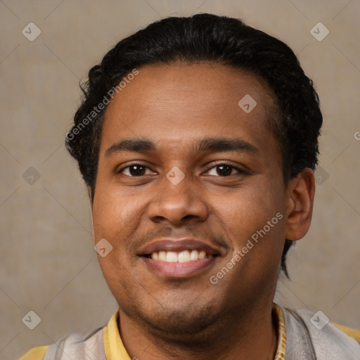 Joyful latino young-adult male with short  black hair and brown eyes