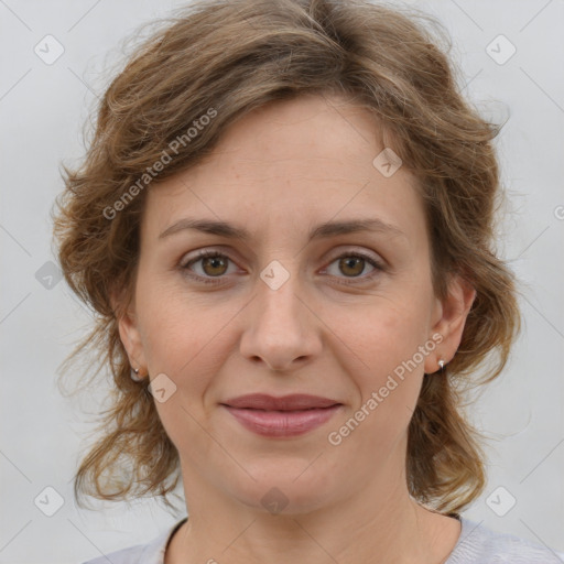 Joyful white young-adult female with medium  brown hair and green eyes