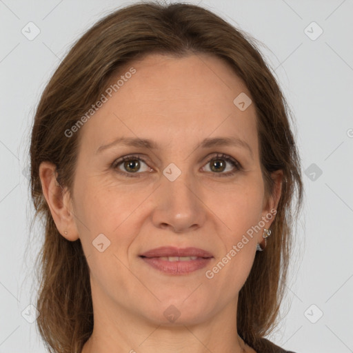 Joyful white adult female with medium  brown hair and brown eyes