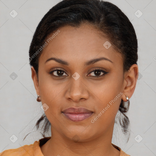 Joyful black young-adult female with short  brown hair and brown eyes