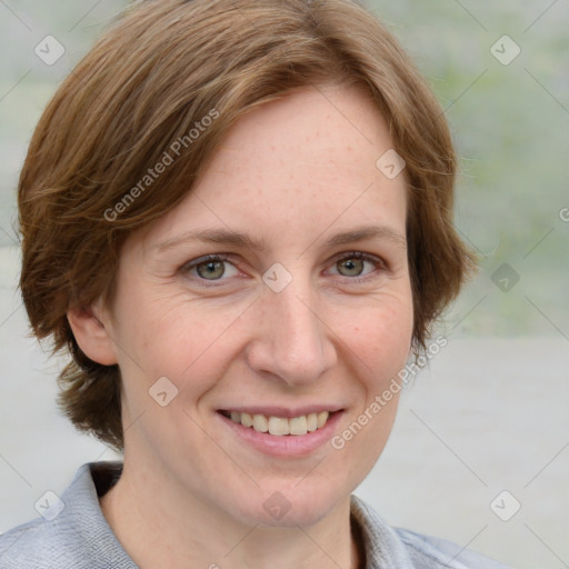 Joyful white adult female with medium  brown hair and blue eyes