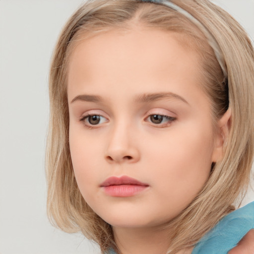 Neutral white child female with long  brown hair and brown eyes