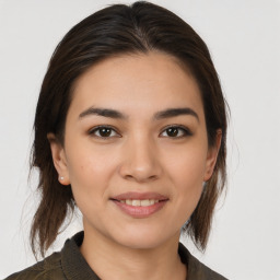 Joyful white young-adult female with medium  brown hair and brown eyes