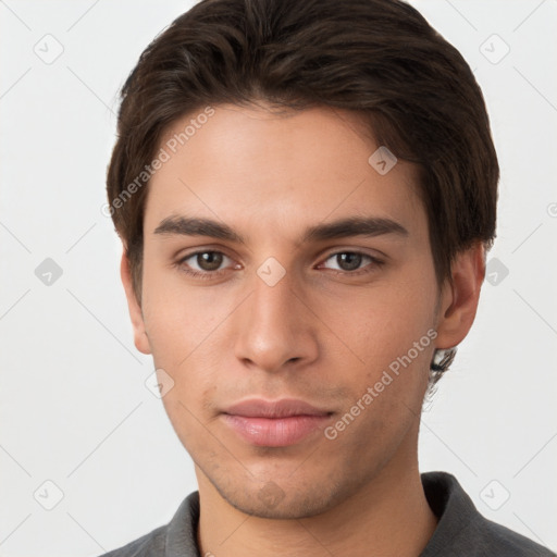 Neutral white young-adult male with short  brown hair and brown eyes