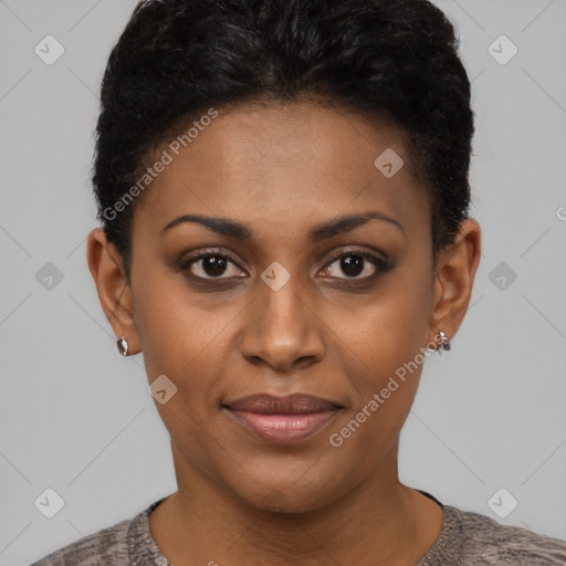 Joyful black young-adult female with short  brown hair and brown eyes