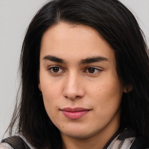 Joyful asian young-adult female with long  brown hair and brown eyes